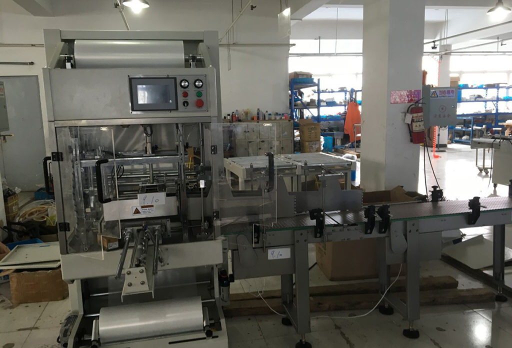 Automatic Water Bottle Shrink Wrap Machine 2 auto machine loading and wrap packing machine