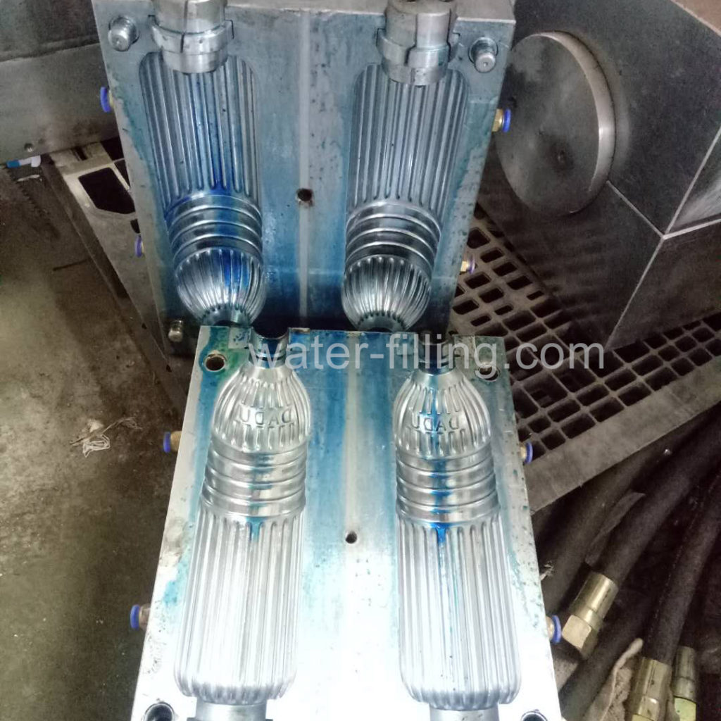 Unleash Affordability PET Bottle Blowing Machine (mold-chiller type) 7 blow-mold-of-water-bottle