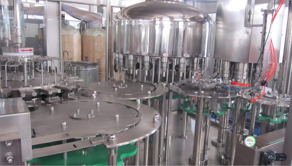 0.2-2 Liter Bottled Water Filling Machine 6000BPH 3in1 6 inside of the bottled water filling machine